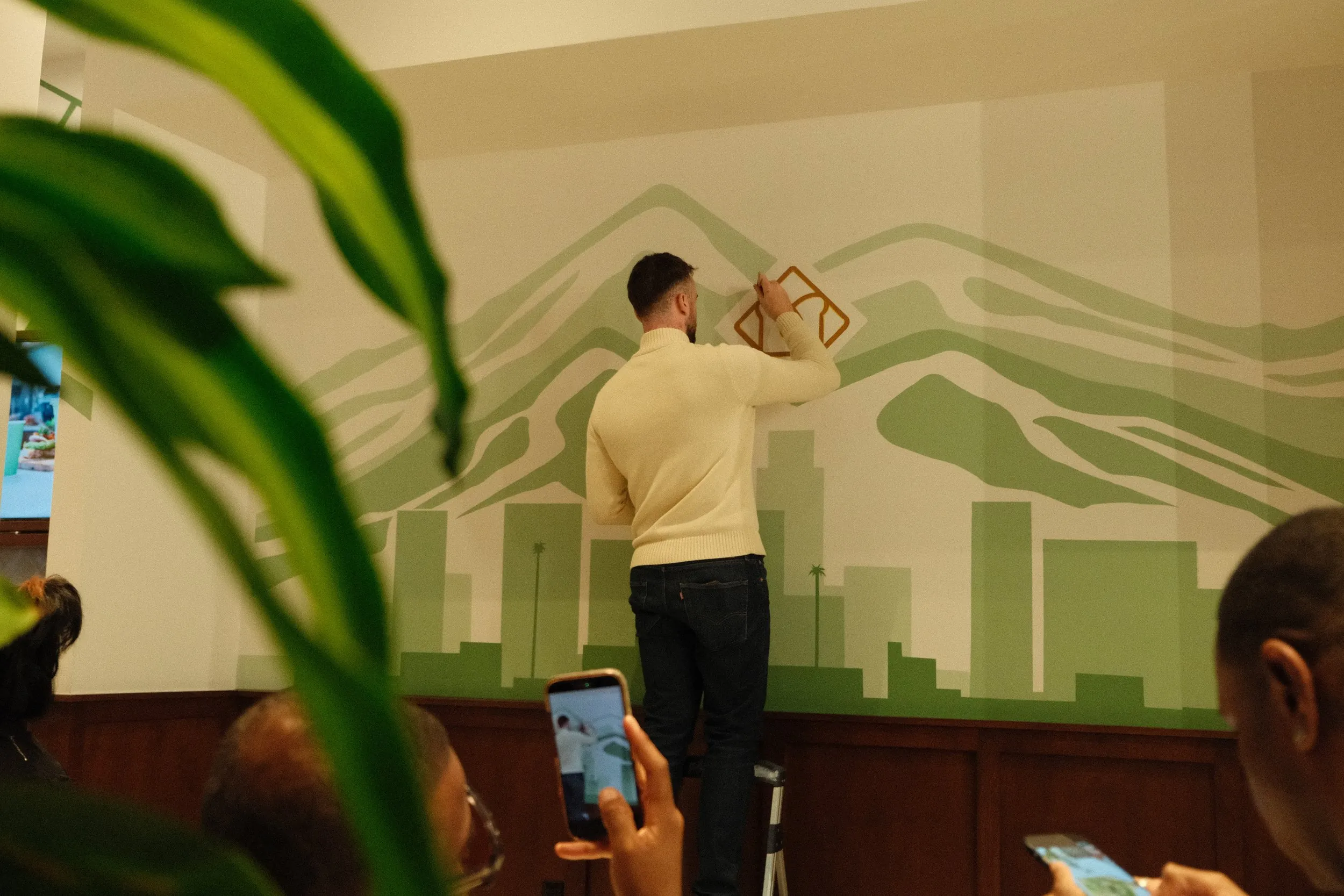 Custom branding mural painted for Toastique restaurant grand opening in Downtown Los Angeles by Pezer97
