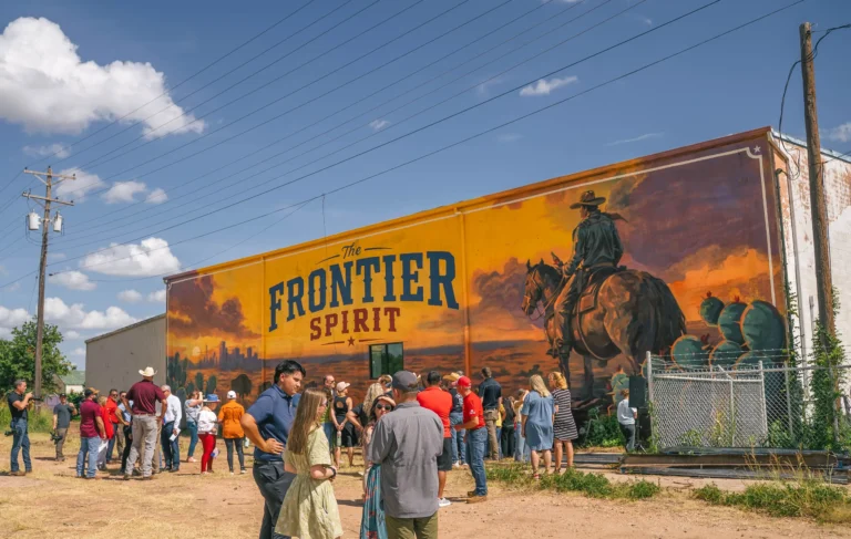 The finished Frontier Spirit mural for Coca-Cola on a building in downtown Abilene, Texas